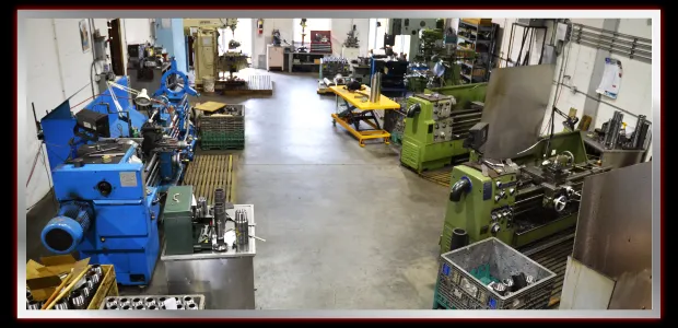 Wide view of the MIR Machining shop floor with lathes and milling machines