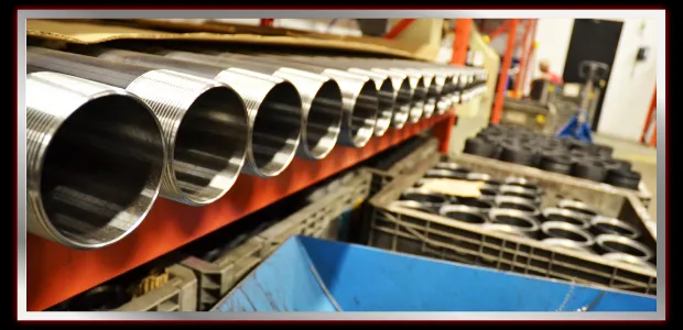Machined threaded couplings racked for production at MIR